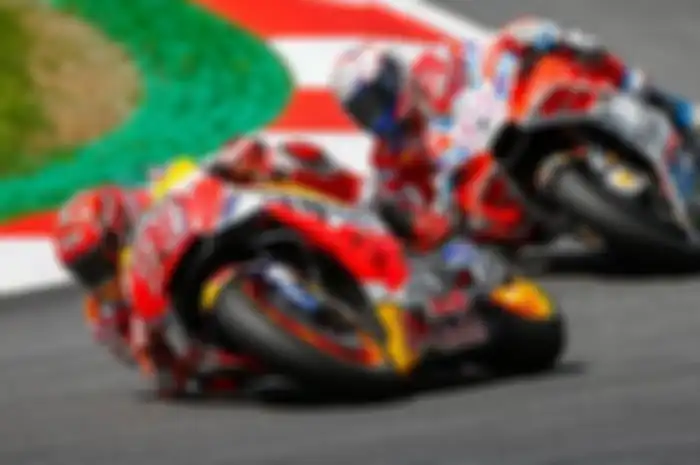 Andrea Dovizioso dan Marc Marquez .