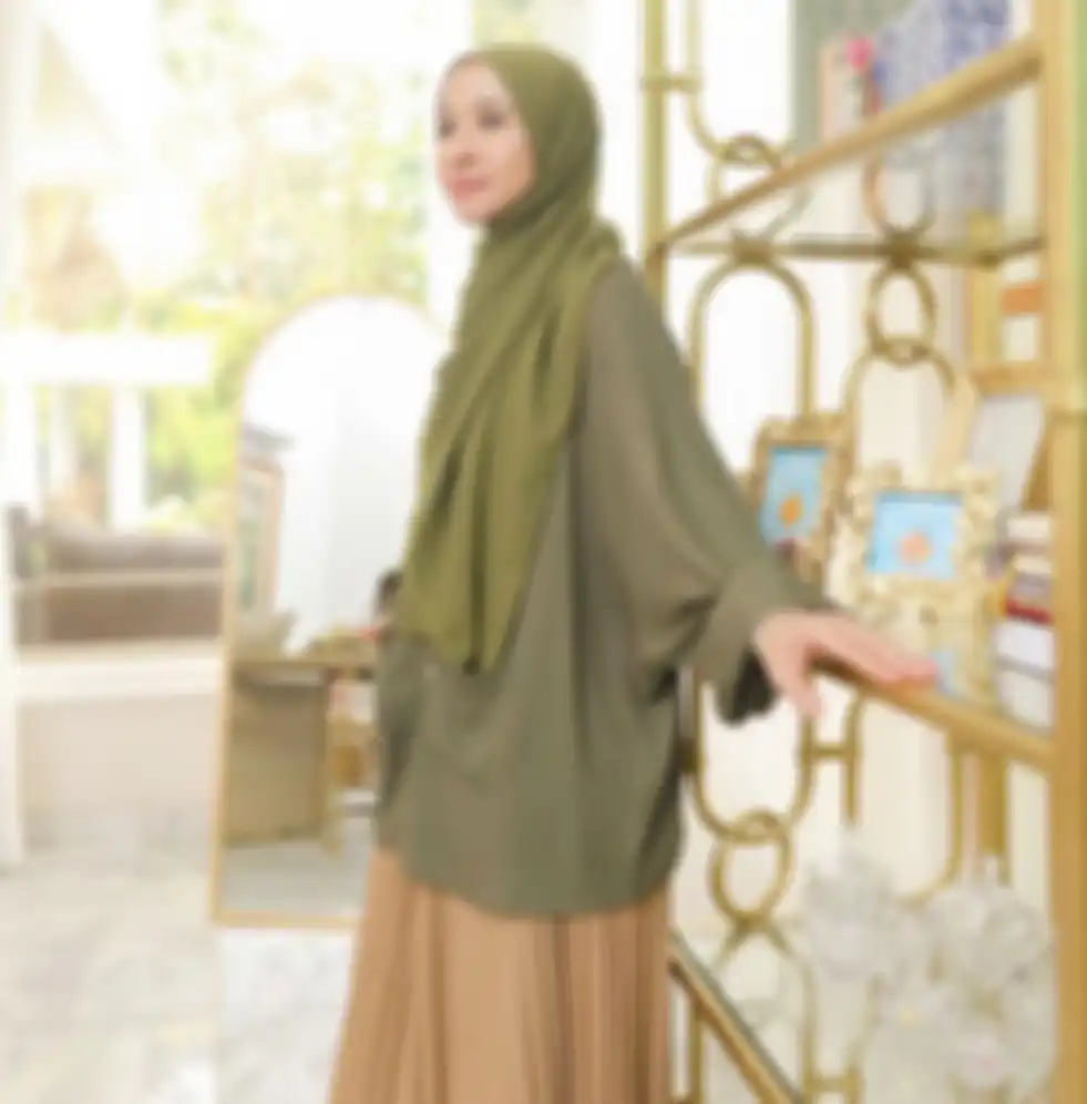 Inspirasi warna OOTD hijau pastel ala Laudya Cynthia Bella bikin penampilan anggun dan stylish
