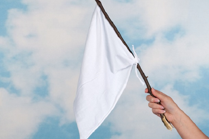 Ilustrasi mengibarkan bendera putih