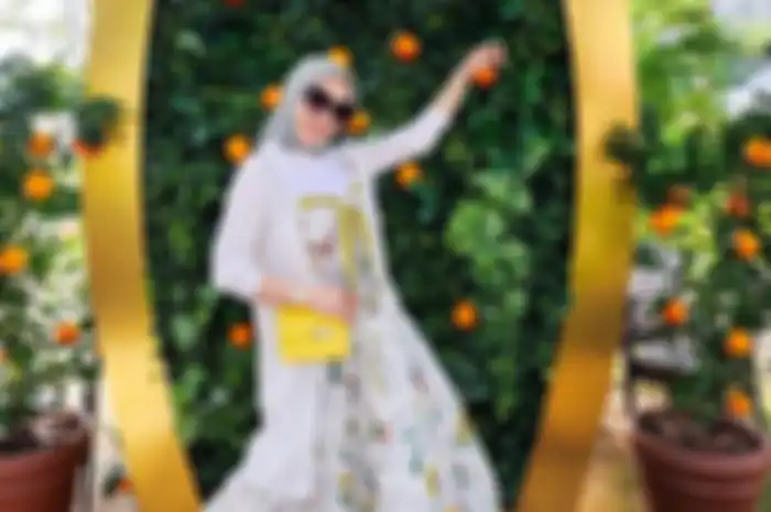 Potret penampilan Syahrini saat di Jepang.