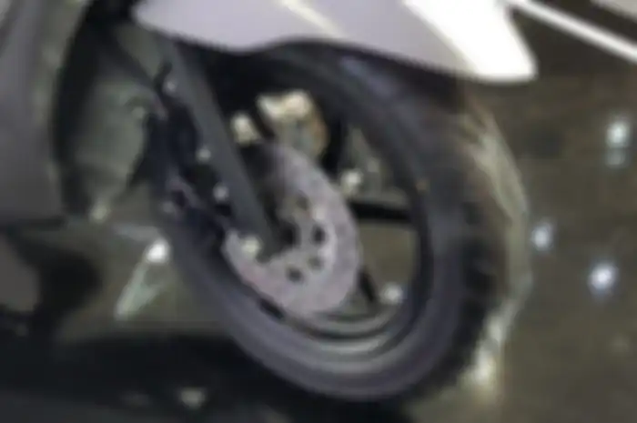 Bagian depan Yamaha FreeGo dengan pelek 12 inci