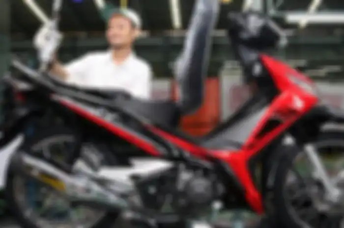 Grafis baru pada Supra X 125 FI warna Energetic Red
