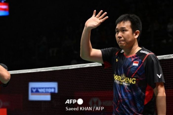 Pasangan ganda putra Indonesia, Mohammad Ahsan/Hendra Setiawan setelah memastikan kemenangan pada semifinal Australian Open 2024 di Quaycentre, Sydney Olympic Park, Australia, Sabtu (15/6/2024).