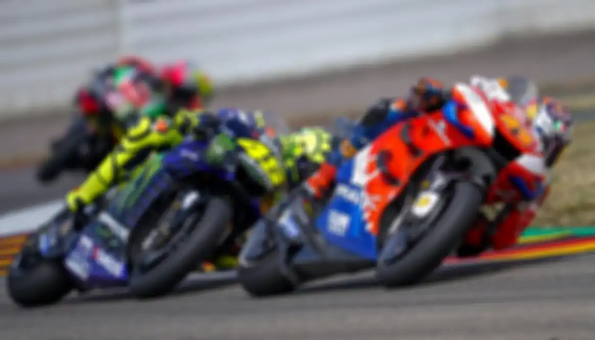 Jack Miller saat duel dengan Valentino Rossi di MotoGP Jerman 2019