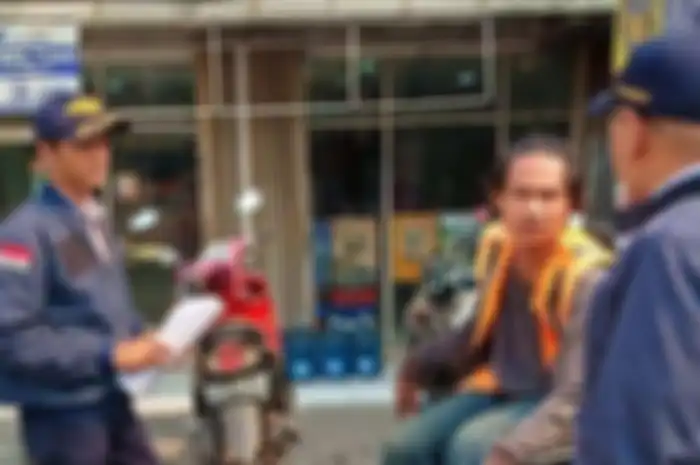 Tukang Parkir Jangan Sok Galak Gak Mau Terima Uang Receh, Pilih Penjara atau Denda Rp 200 Juta (foto ilustrasi)
