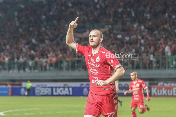 Striker Persija Jakarta, Michael Krmencik, nampak melakukan selebrasi seusai mencetak gol dalam laga pekan kedelapan Liga 1 2022 di Stadion Patriot Candrabhaga, Bekasi, Jawa Barat, 3 September 2022.