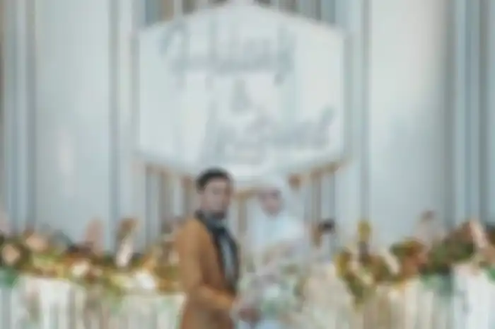 Hulaefi dan Lindswell saat di pelaminan