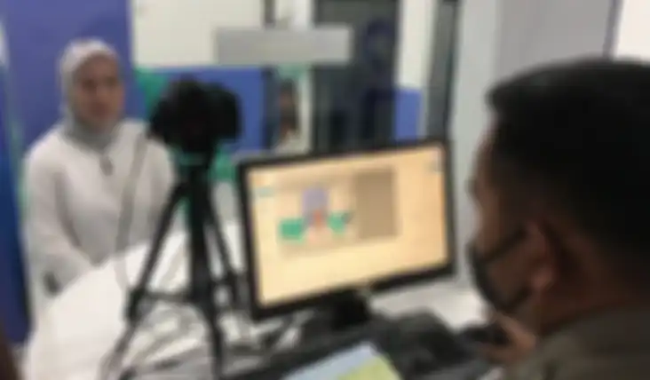 Ilustrasi. Proses foto SIM pada zona identifikasi di Satpas SIM Polres Metro Bekasi.