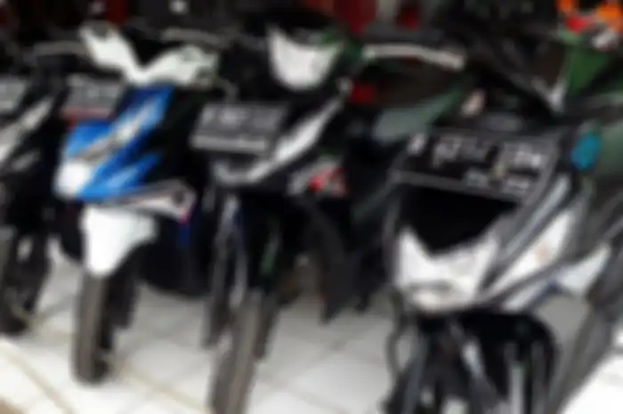 Ilustrasi pedagang motor bekas.
