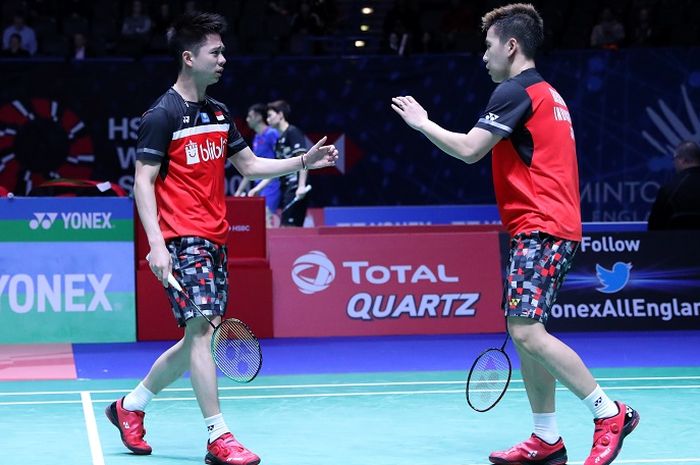 Pasangan ganda putra Indonesia, Marcus Fernaldi Gideon/Kevin Sanjaya Sukamuljo, bereaksi pada babak pertama All England Open 2019 di Arena Birmingham, Inggris, Rabu (6/3/2019).