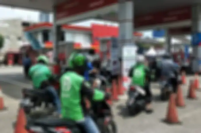 Ilustrasi para driver ojol yang merupakan calon penerima BSU ojol.