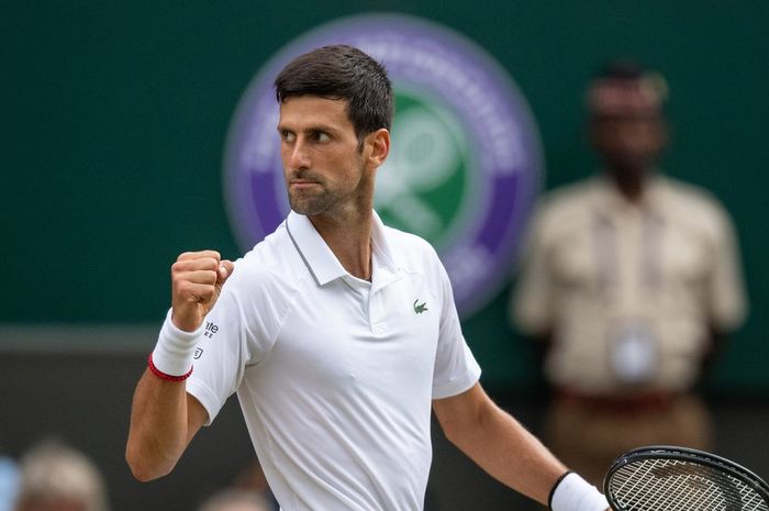 Novak Djokovic (Serbia) saat tampil pada partai final nomor tunggal putra Wimbledon 2019, Minggu (14/7/2019)