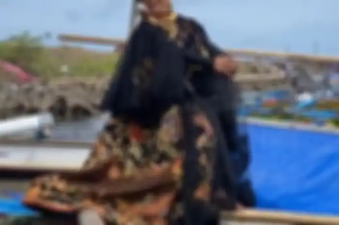 Gaya Susi Pudjiastuti saat jadi model