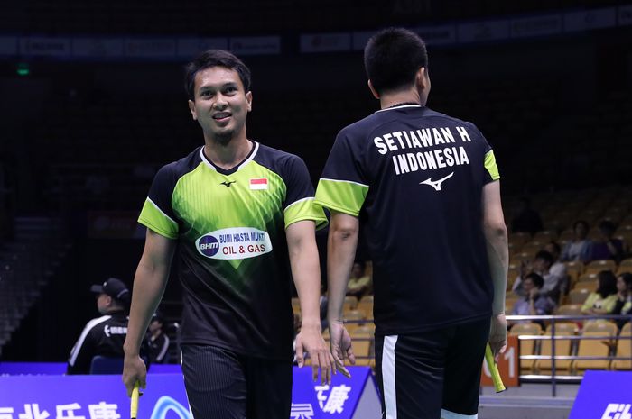 Pasangan ganda putra Indonesia, Mohammad Ahsan/Hendra Setiawan, saat berlaga pada babak kesatu Kejuaraan Asia 2019 di Wuhan Sports Center Gymnasium, Rabu (24/4/2019).