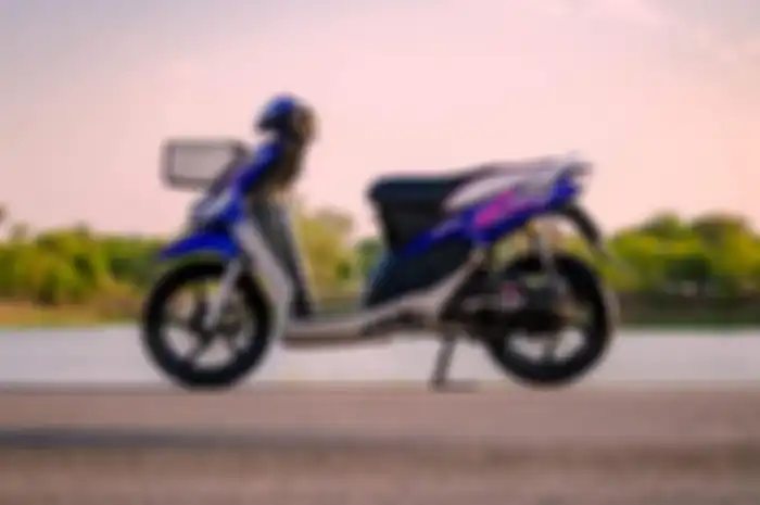 Modifikasi Yamaha Mio lawas berkonsep minimalis dan bertabur banyak aksesoris.
