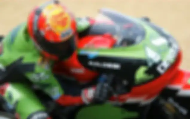 Helm Chupa Chups dipakai pada awal karier balap Jorge Lorenzo di kelas 125 cc bersama tim Cajca Madrid Derbi Racing.