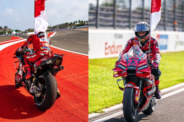 Momen Enea Bastianini (Ducati Lenovo) bawa bendera Indonesia di MotoGP Mandalika 2023.