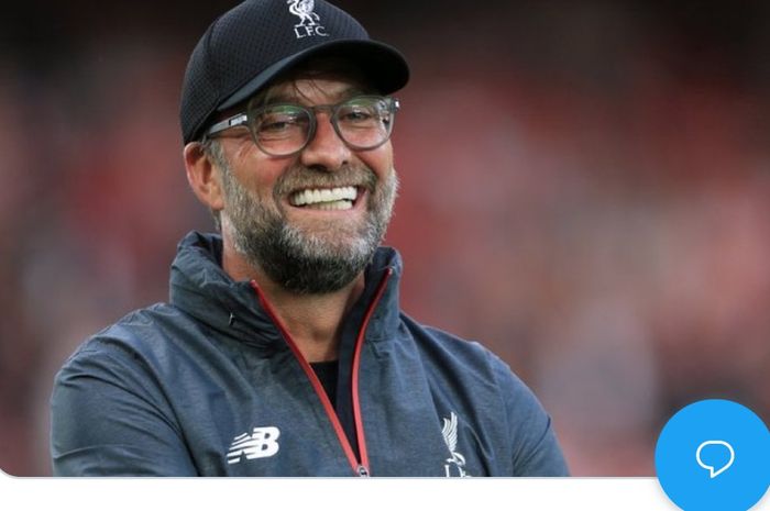 Juergen Klopp, pelatih Liverpool yang murah senyum. 