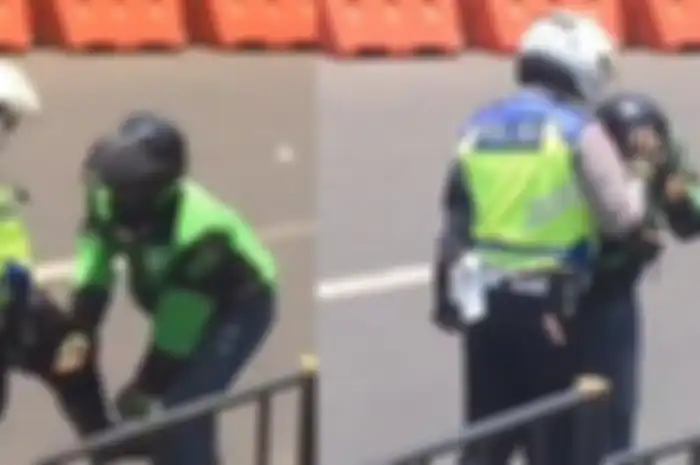 Seorang anggota polisi kedapatan menendang dan memukul driver ojek online, ketika tengah mengamankan jalan yang akan dilalui Preseden