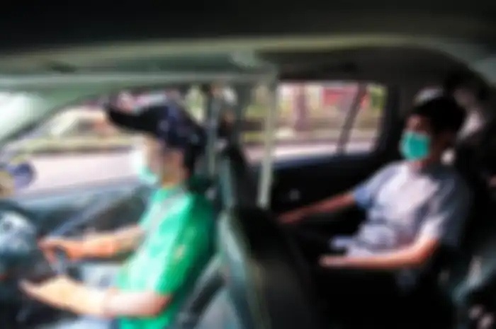 Armada khusus GrabCar yang dibuatkan pembatas antara pengemudi dengan penumpang.