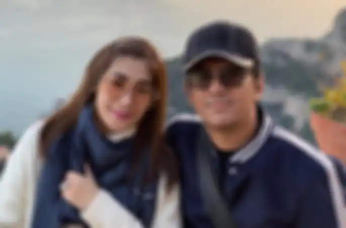 Andre Taulany dan istri