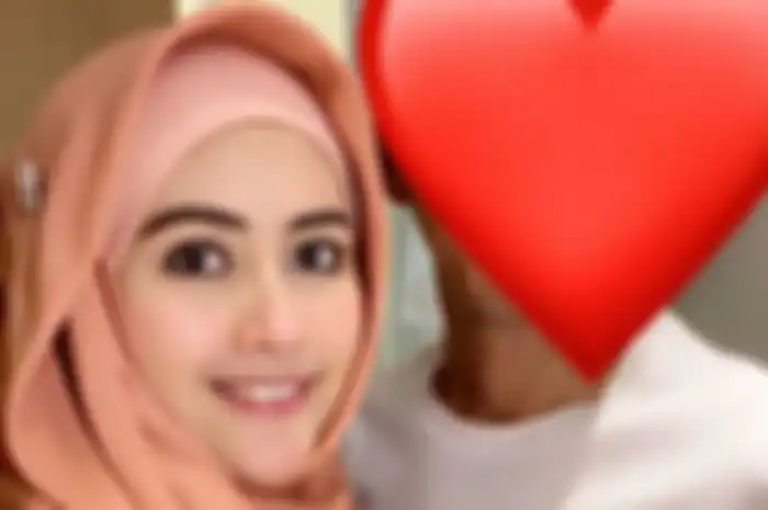 Foto Meggy Wulandari dan suami barunya yang masih disembunyikan identitasnya