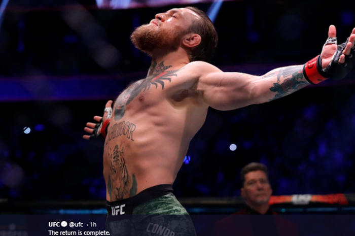 Selebrasi Conor McGregor usai menang dalam waktu 40 detik lawan Donald Cerrone pada UFC 246 di T-Mobile Arena, Las Vegas, Minggu (19/1/2020). 