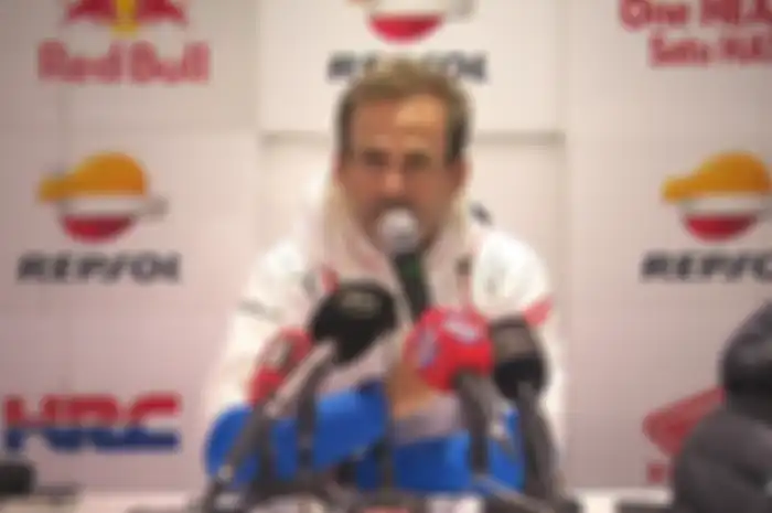 Alberto Puig tak yakin soal waktu pemulihan Marc Marquez cedera.
