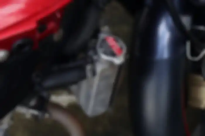 Ilustrasi radiator motor. Isi ulang air radiator motor pakai air buangan AC aman atau tidak?