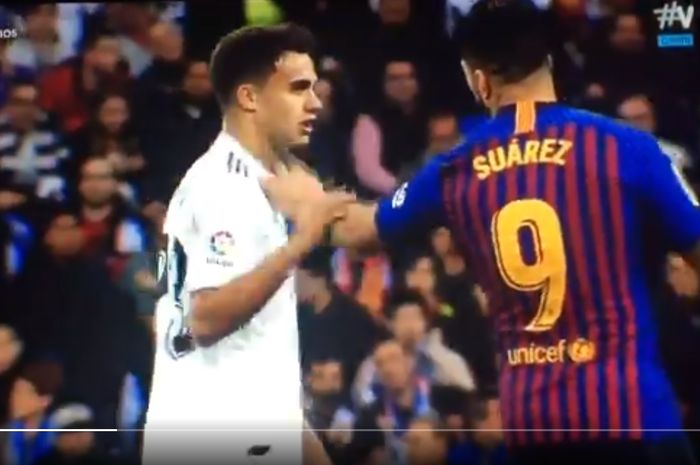 Bek Real Madrid, Sergio Reguilon, terlibat insiden dengan 2 pemain Barcelona, Luis Suarez dan Lionel Messi, pada partai pekan ke-26 Liga Spanyol bertajuk el clasico, 2 Maret 2019. 