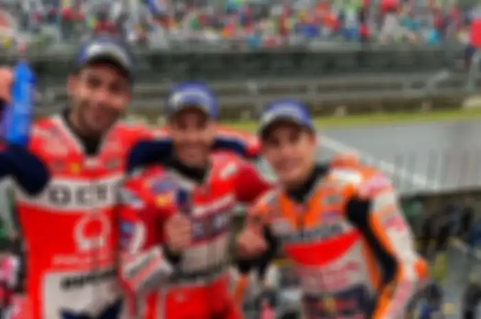 Danilo Petrucci, Andrea Dovizioso, dan Marc Marquez naik podium di MotoGP Jepang 2017