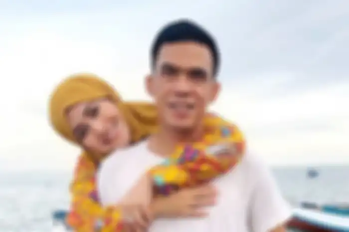 Meggy Wulandari dan suami barunya