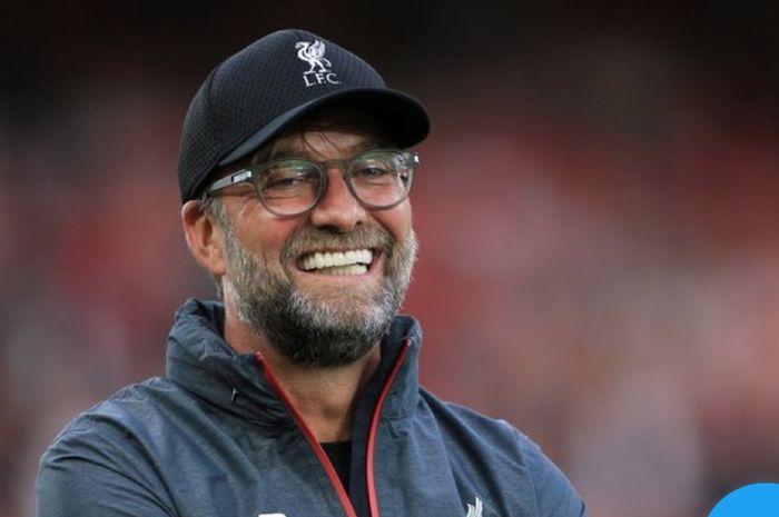 Juergen Klopp, pelatih Liverpool yang murah senyum. 