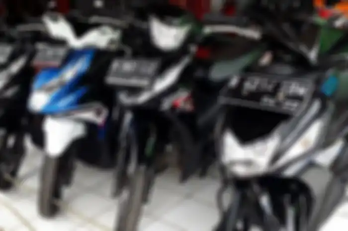 Ilustrasi pedagang motor bekas.