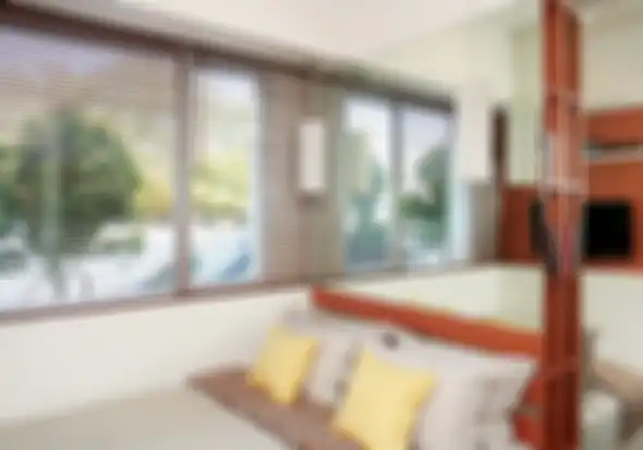 Ilustrasi headboard yang dilapisi cermin berukuran lebar.