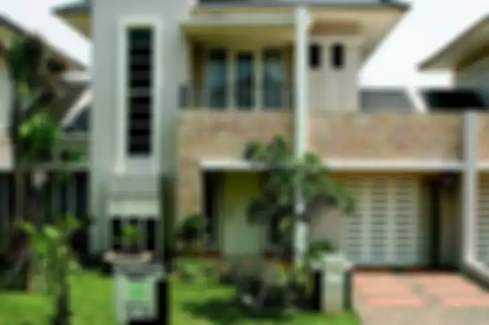 Ilustrasi rumah yang menggunakan solar panel sebagai sumber energi listrik.