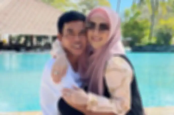 Meggy Wulandari dan sang suami