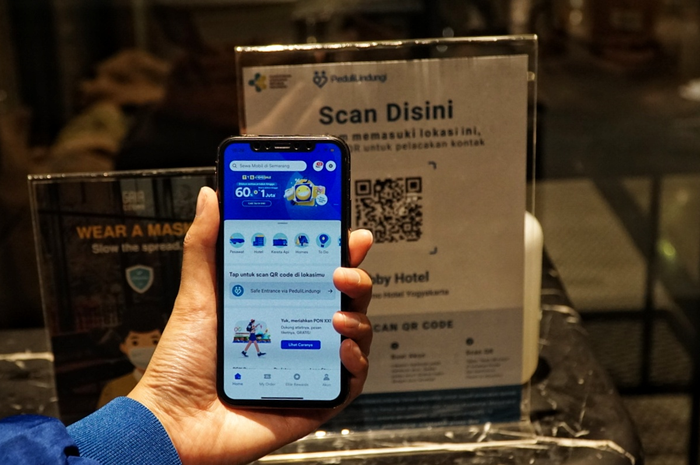 Ilustrasi scan PeduliLindungi lewat aplikasi tiket.com.