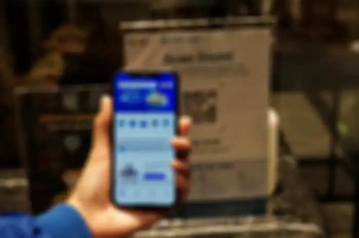 Ilustrasi scan PeduliLindungi lewat aplikasi tiket.com.
