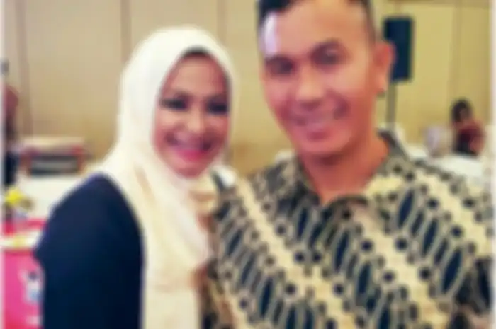 Ira Riswana dan suami Kombes Abu Bakar Tertusi.