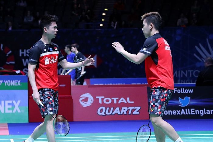 Pasangan ganda putra Indonesia, Marcus Fernaldi Gideon/Kevin Sanjaya Sukamuljo, bereaksi pada babak pertama All England Open 2019 di Arena Birmingham, Inggris, Rabu (6/3/2019).