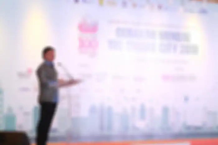 Menkominfo Johnny G. Plate saat memberikan sambutan di acara Exhibition, Evaluation, & Presidential Lecture Gerakan Menuju 100 Smart City 2019.